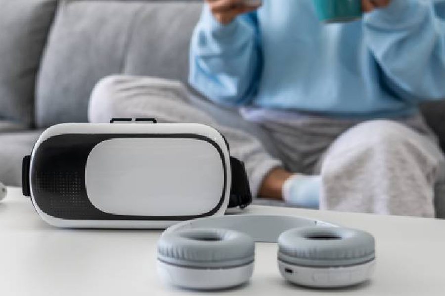Gadgets set out on a coffee table at home